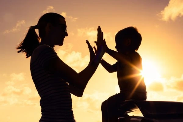 Image of happy mother and child after resolving child arrangements Mid Glamorgan